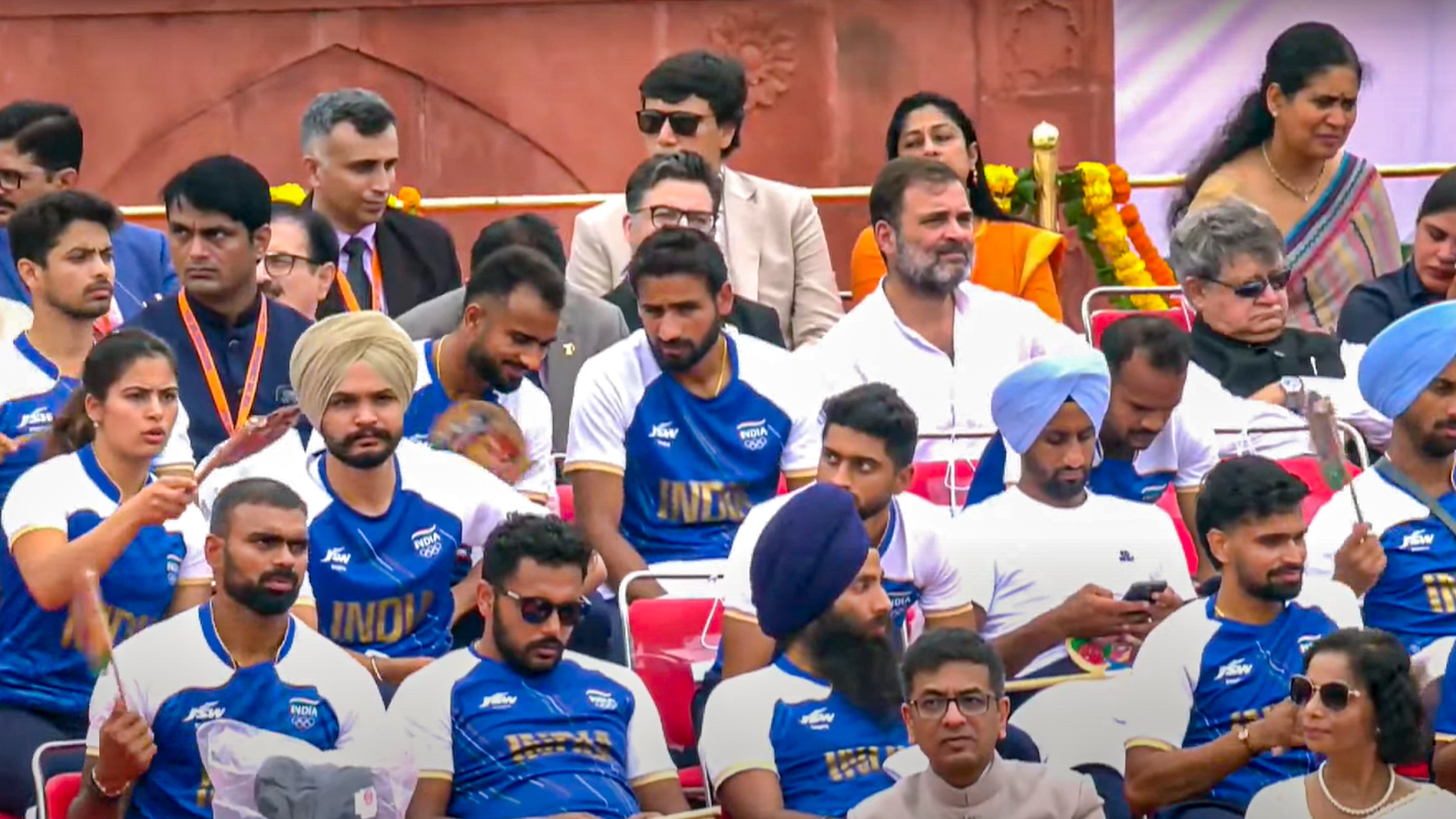 <div class="paragraphs"><p>Leader of Opposition in Lok Sabha Rahul Gandhi with the Paris Olympics 2024 medal winning contingent and others during the 78th Independence Day celebration at the Red Fort, in New Delhi, Thursday.</p></div>